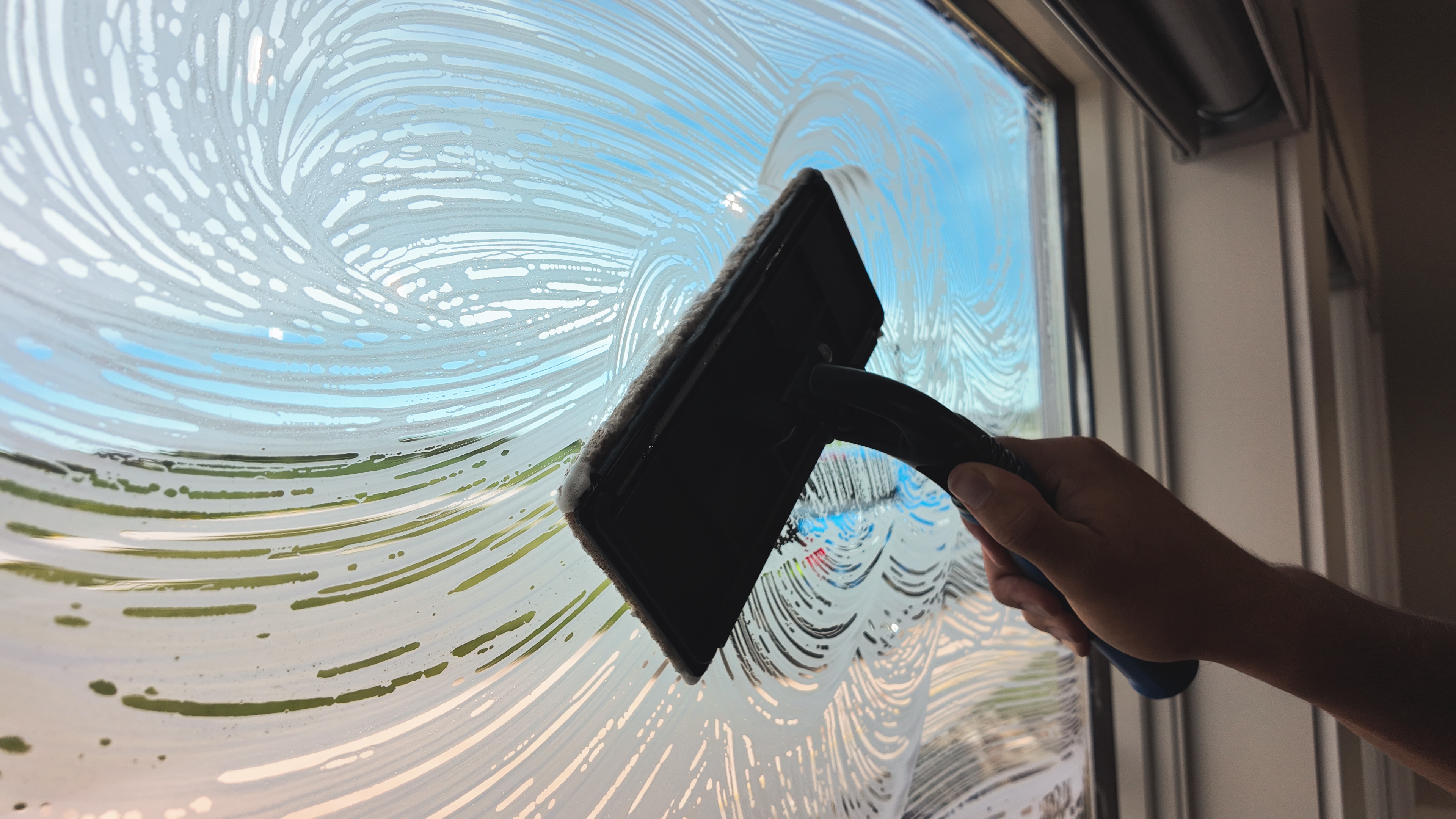 Scrub — interior window cleaning step