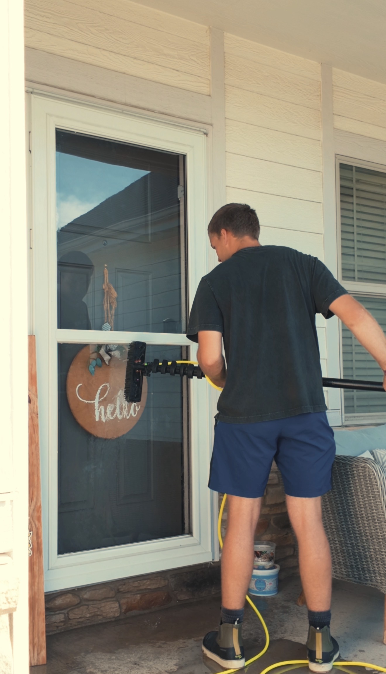 Detail — exterior window cleaning step